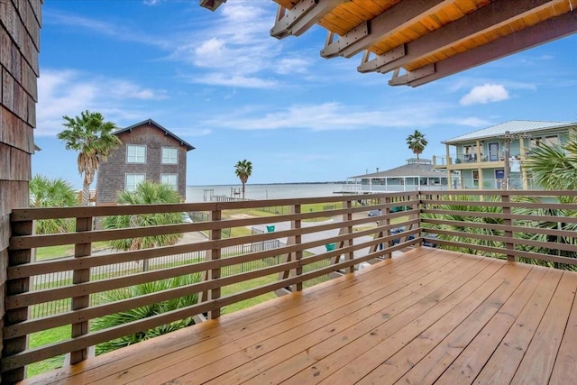 wooden terrace with a water view