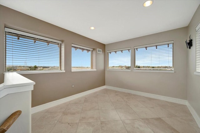 view of tiled spare room