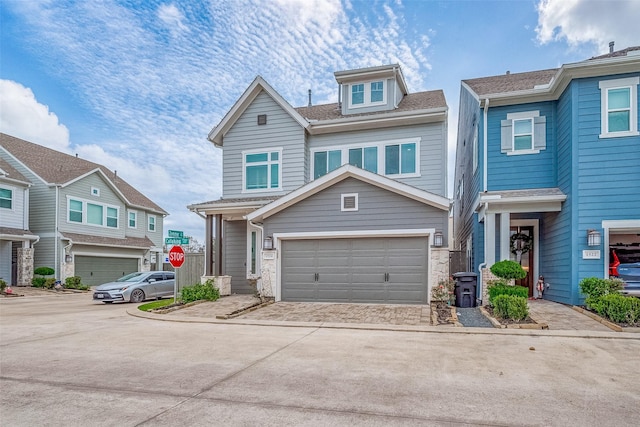 townhome / multi-family property featuring a garage