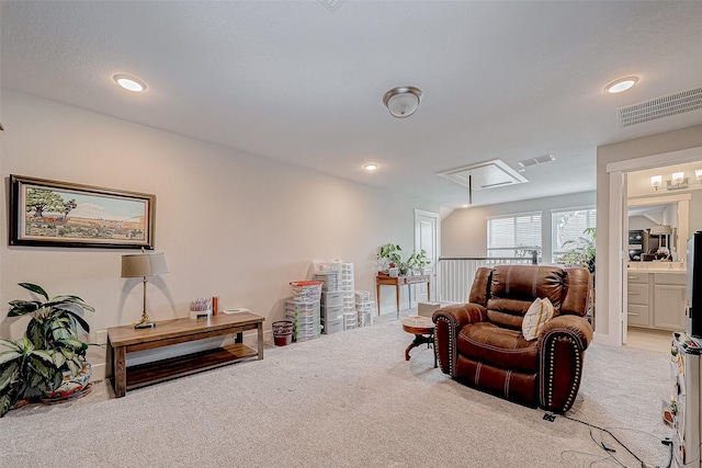 living room featuring light colored carpet