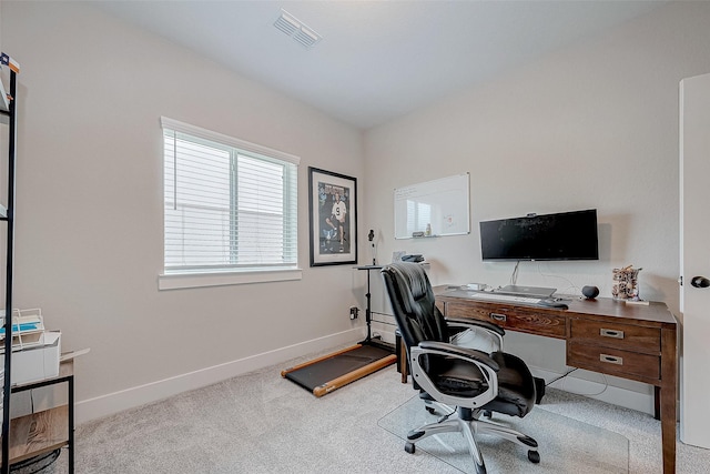 home office with light colored carpet