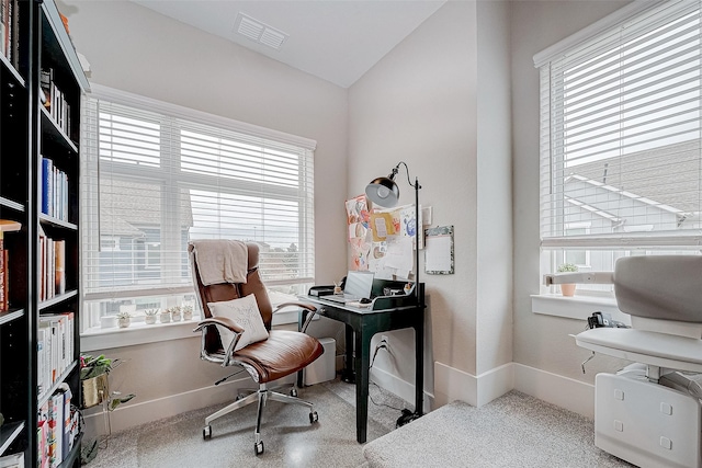 home office featuring a wealth of natural light