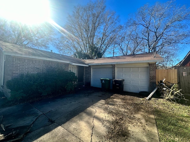 exterior space with a garage