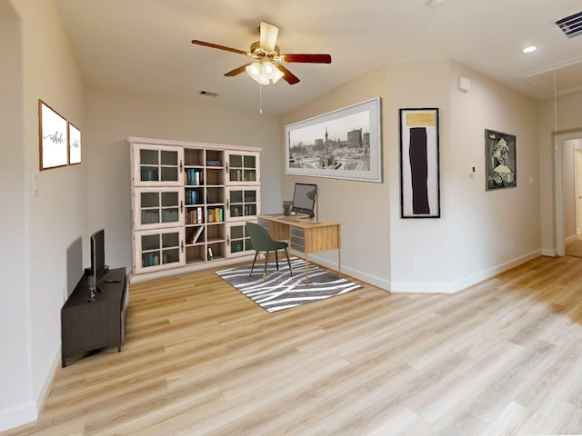 office area with ceiling fan and light hardwood / wood-style flooring