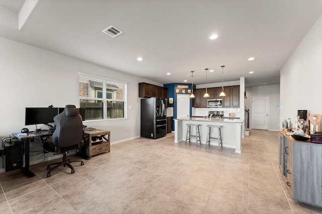 office featuring light tile patterned flooring