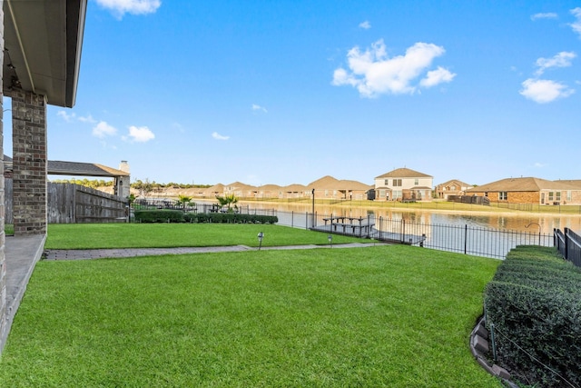 view of yard featuring a water view