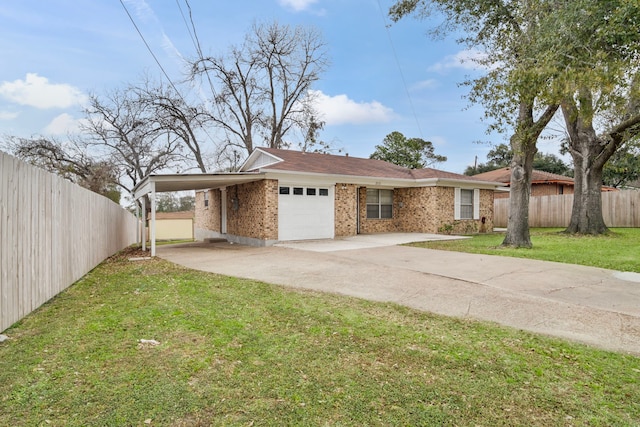 view of front of home with a front yard and a carport