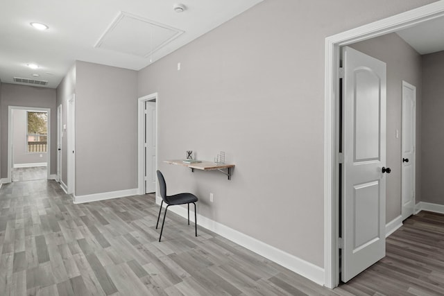 hallway featuring light hardwood / wood-style flooring