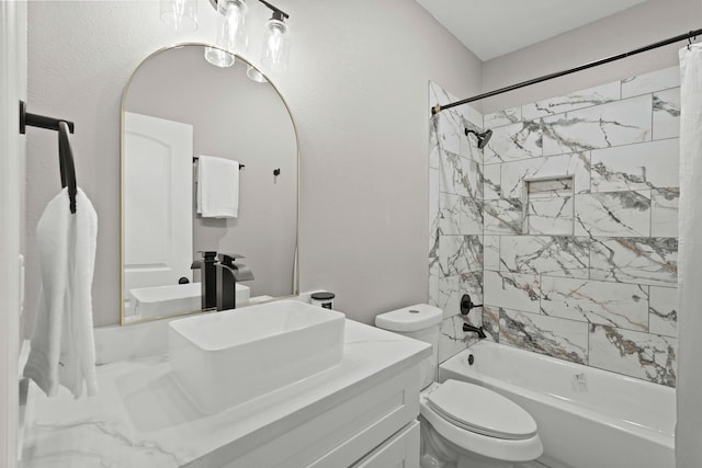 full bathroom featuring shower / bath combo with shower curtain, vanity, and toilet