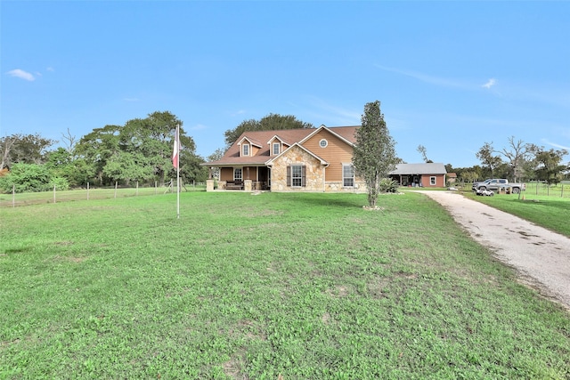 view of front of home with a front lawn