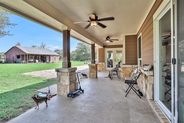 view of patio / terrace featuring ceiling fan