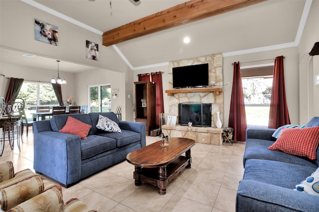 tiled living room featuring a stone fireplace, crown molding, ceiling fan with notable chandelier, and vaulted ceiling with beams