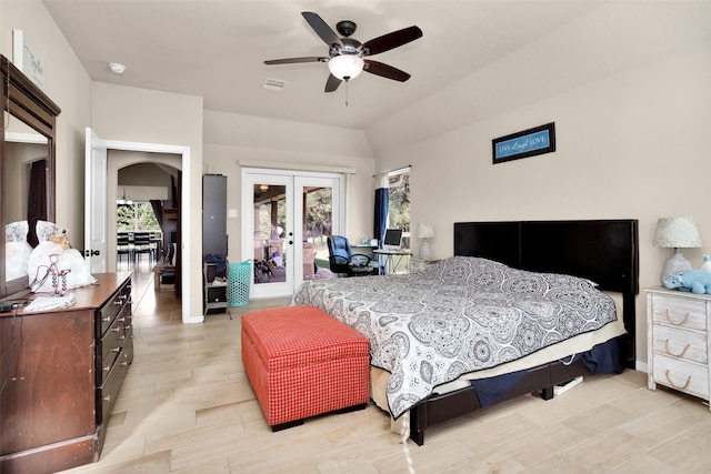 bedroom featuring french doors, access to outside, vaulted ceiling, and ceiling fan