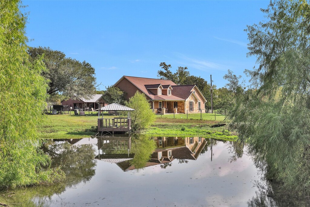 16537 Fm 1227, Navasota, TX 77868 - rear view of property featuring a gazebo and a water view