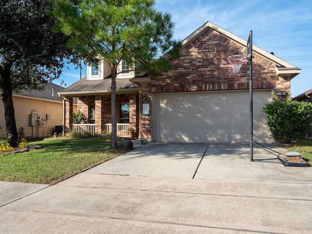 front facade featuring a front lawn, covered porch, and a garage