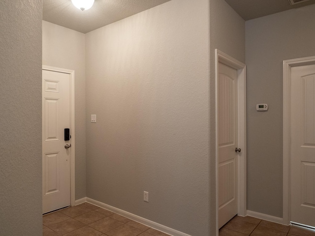 view of tiled entrance foyer