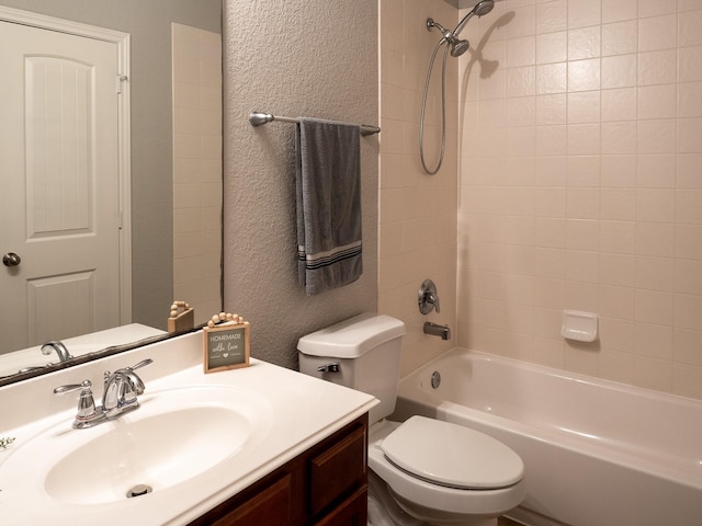 full bathroom with vanity, bathtub / shower combination, and toilet