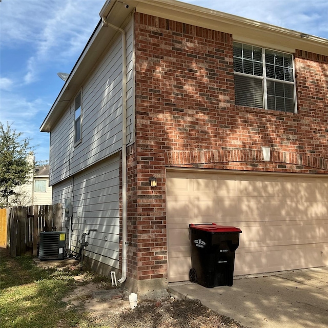 view of home's exterior with central air condition unit