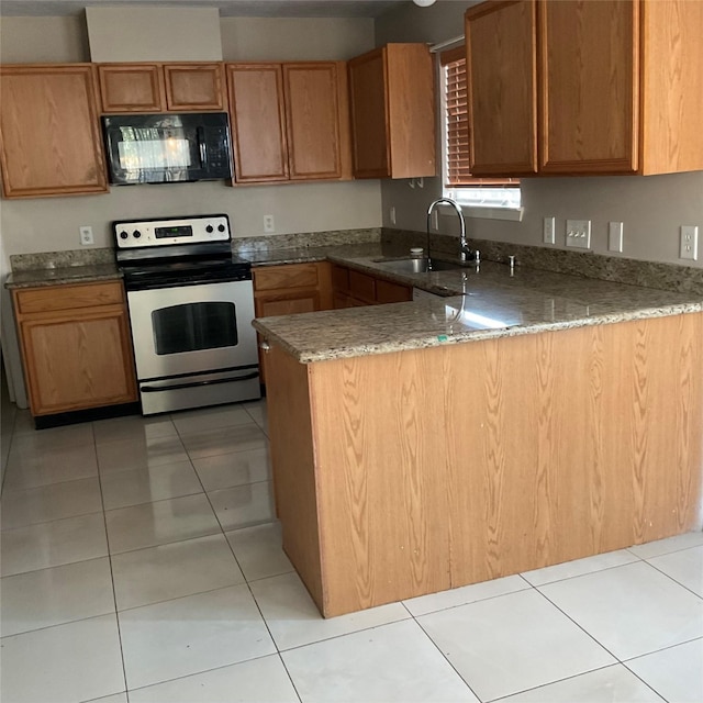 kitchen featuring kitchen peninsula, electric stove, sink, and light tile patterned floors