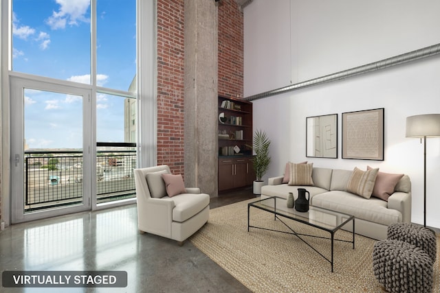 living room with a high ceiling