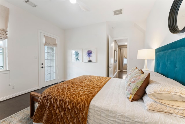 bedroom with ceiling fan and hardwood / wood-style flooring