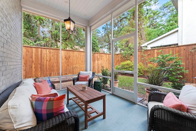 sunroom / solarium featuring plenty of natural light