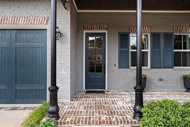 property entrance featuring covered porch