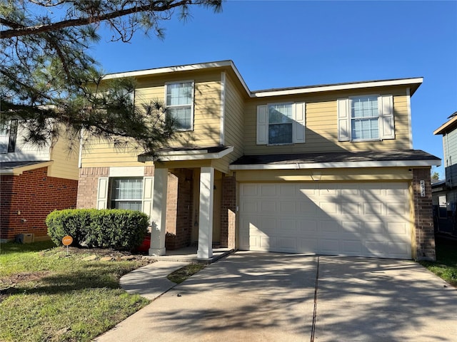 view of front of home with a garage