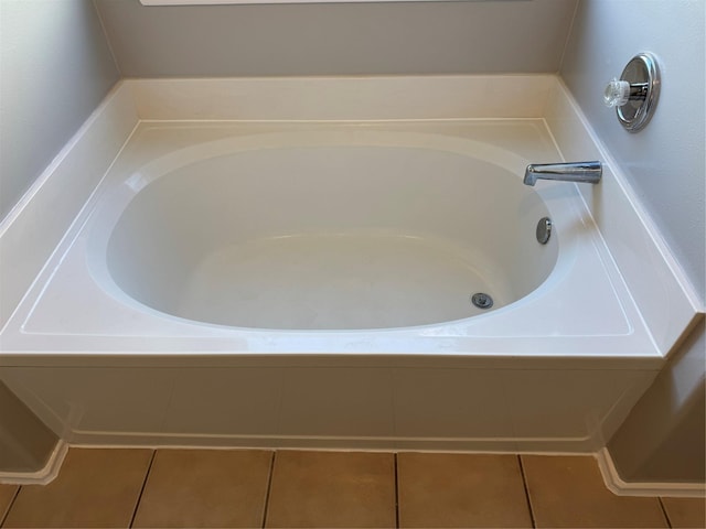 bathroom with tile patterned flooring