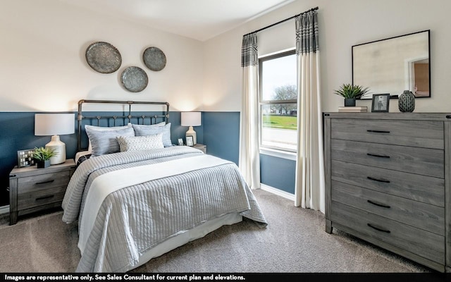 bedroom featuring carpet