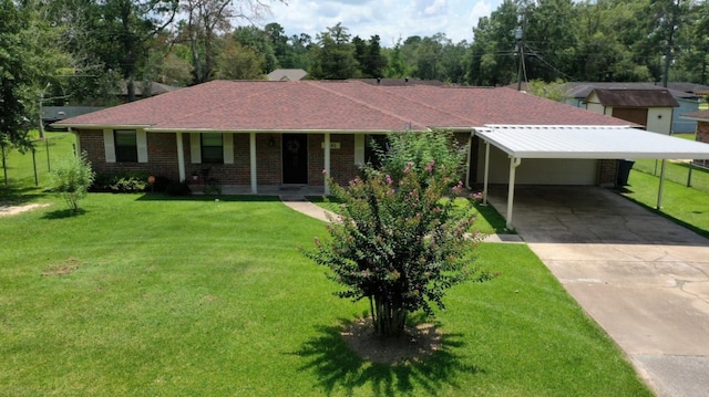 single story home featuring a garage, covered porch, and a front lawn