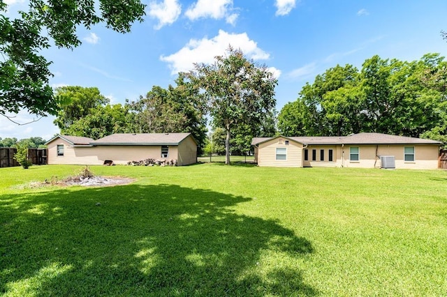 view of yard featuring central AC