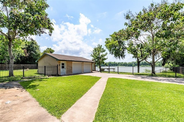 ranch-style house featuring an outbuilding, a front lawn, and a garage