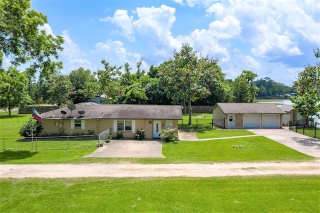 ranch-style home with a garage and a front yard