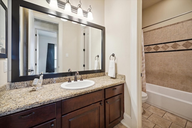 full bathroom featuring vanity, toilet, and shower / tub combo