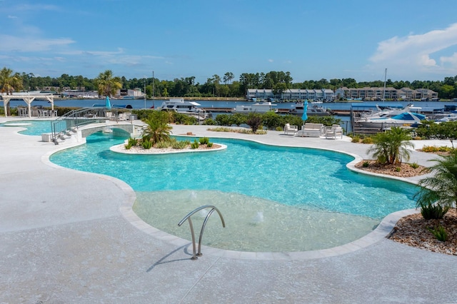 view of pool featuring a patio area