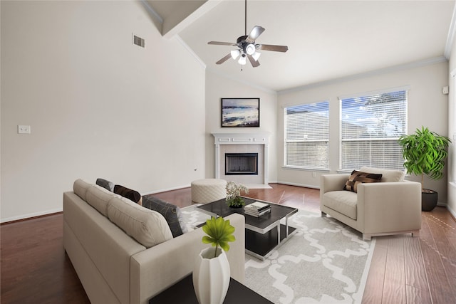 living room featuring ceiling fan, a fireplace, crown molding, hardwood / wood-style flooring, and high vaulted ceiling