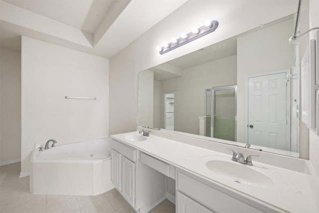 bathroom featuring shower with separate bathtub, tile patterned floors, and vanity