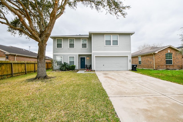 view of front property featuring a front yard and a garage