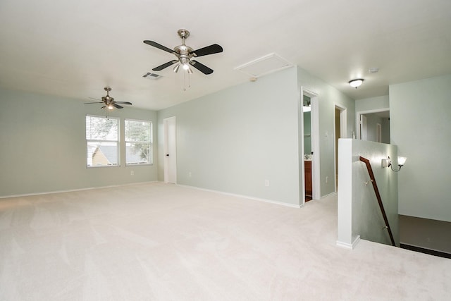 carpeted empty room with ceiling fan