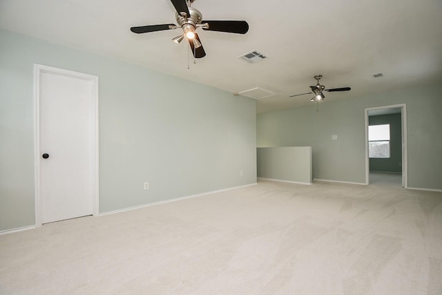 carpeted empty room with ceiling fan