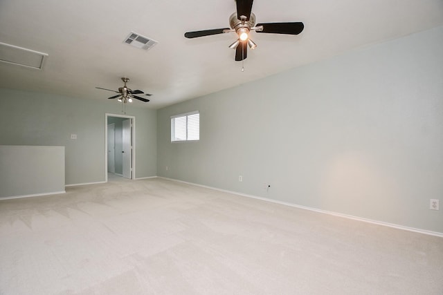 unfurnished room with ceiling fan and light colored carpet