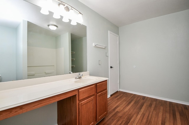 bathroom with vanity and hardwood / wood-style flooring