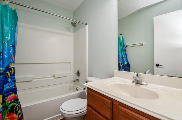 full bathroom featuring vanity, shower / bath combination with curtain, and toilet