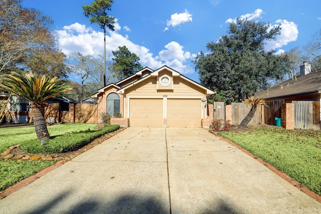 ranch-style home featuring a garage and a front yard