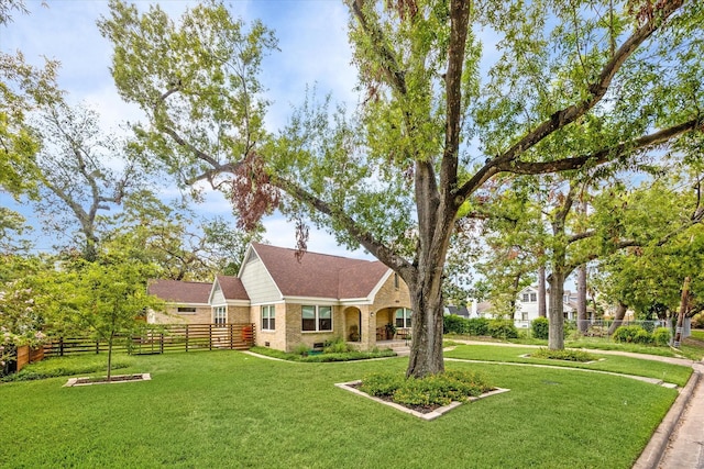 view of front facade with a front yard