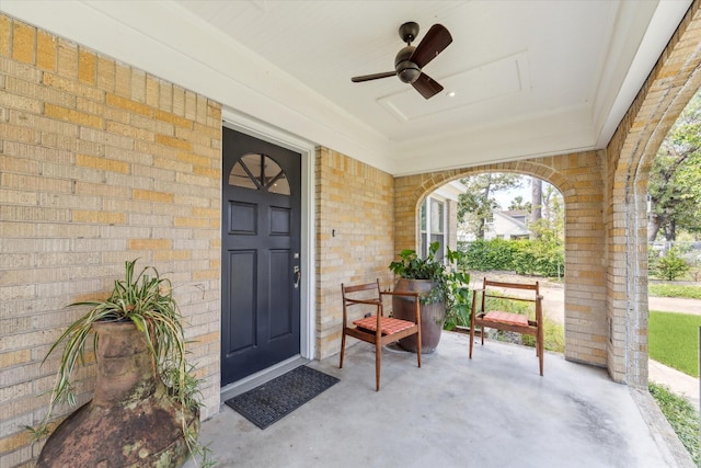 property entrance with ceiling fan