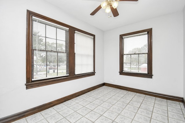 spare room featuring ceiling fan