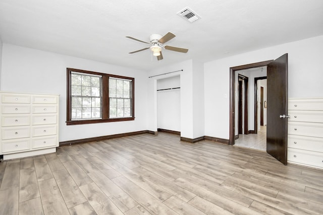 unfurnished bedroom featuring light hardwood / wood-style floors and ceiling fan