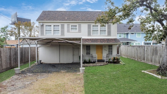 front of property featuring covered porch and a front lawn